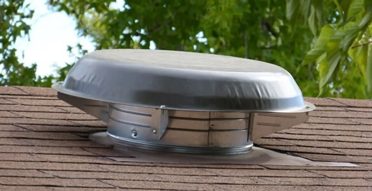 attic fan installation services with low-profile roof ventilation unit in Lancaster, PA