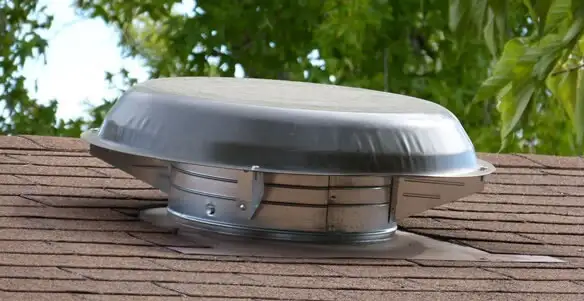 attic fan installation services with low-profile roof ventilation unit in Lancaster, PA