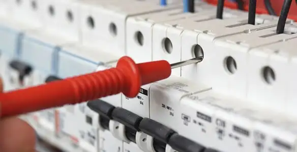 Electrical contractor testing circuit breakers during electrical repair in Mountville, PA