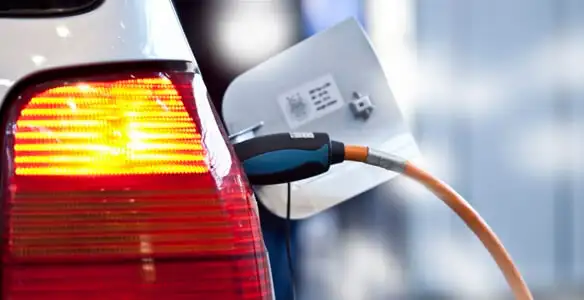 Electric car plugged into EV charger after professional installation in Lancaster, PA