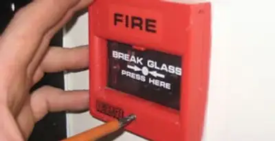 fire alarm installation service showing manual fire alarm pull station installed by licensed electricians in Lancaster, PA