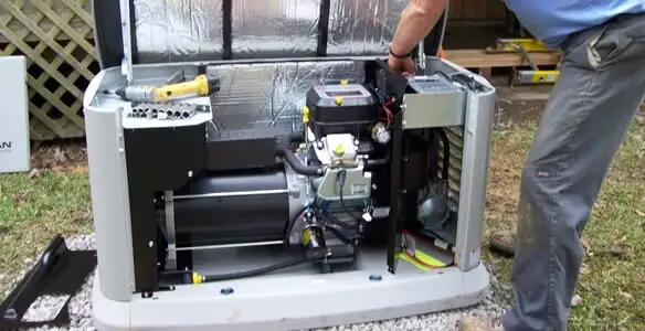 generator installation service showing technician connecting and configuring generator components in Lancaster, PA