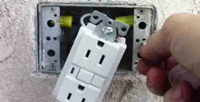 gfci circuits service showing installation of a ground fault circuit interrupter outlet by licensed electricians in Lancaster, PA