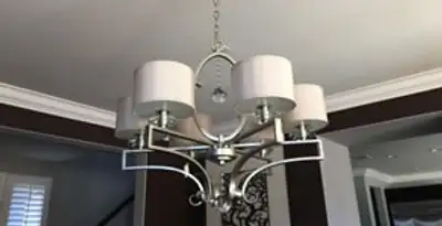 Modern chandelier installation with multiple light fixtures in Lancaster, PA