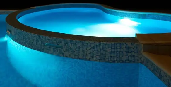 pool light installation and repair services highlighting illuminated pool interior lighting in Lancaster, PA