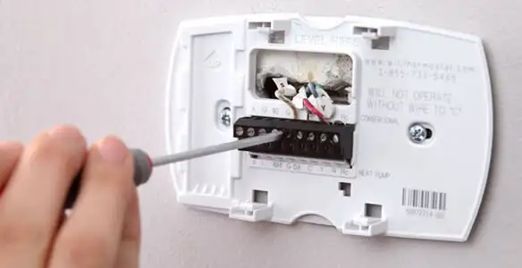 Thermostat installation service with proper wiring and secure wall mounting in Lancaster, PA