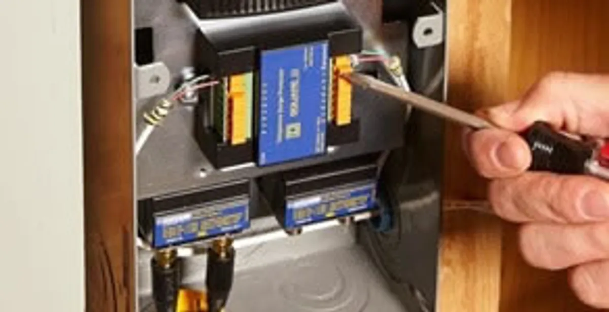 Whole home surge protection device being installed by a licensed electrician to protect electrical systems in Lancaster, PA