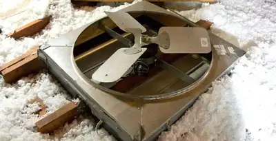 whole house fan installation services with attic-mounted ventilation unit in Lancaster, PA